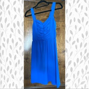 Silky blue sleeveless cocktail dress